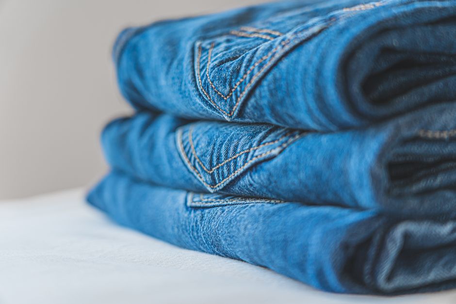 Neatly folded clothes in a luxury custom closet
