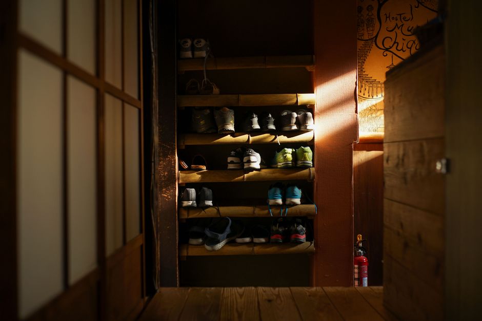 Shoe rack organization in a reach-in closet